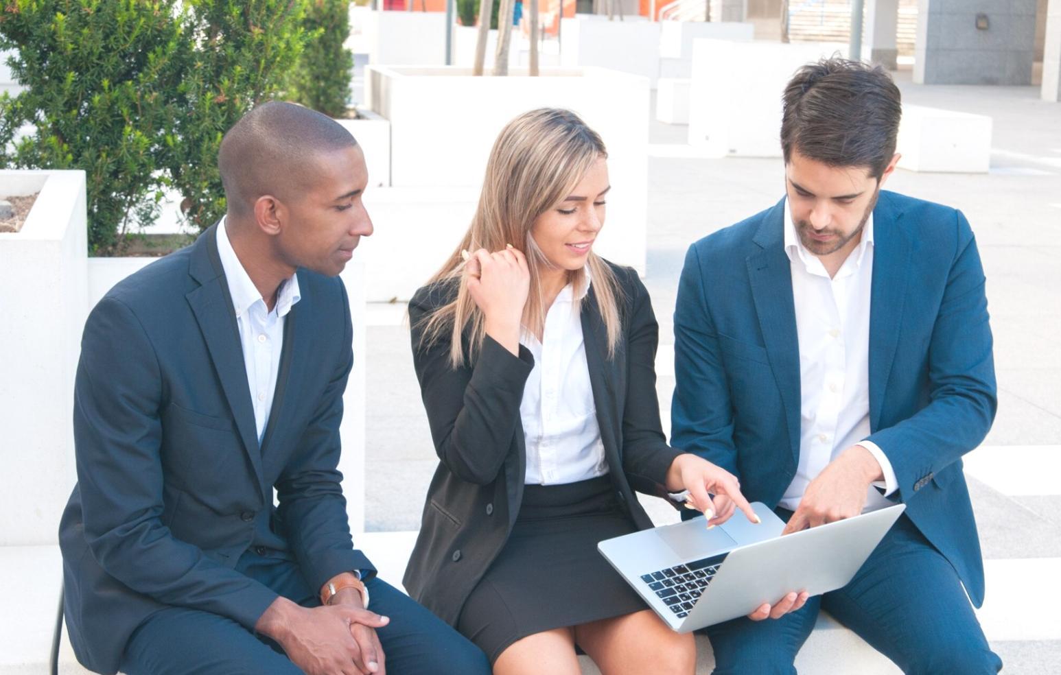 Professional workshop setting with advertising campaign strategy materials